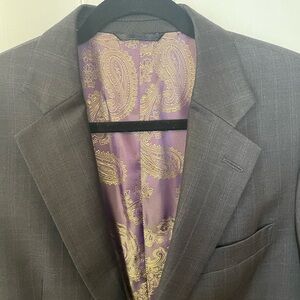 Men’s suit, dark grey check pattern. Jacket 40, pants 32.
